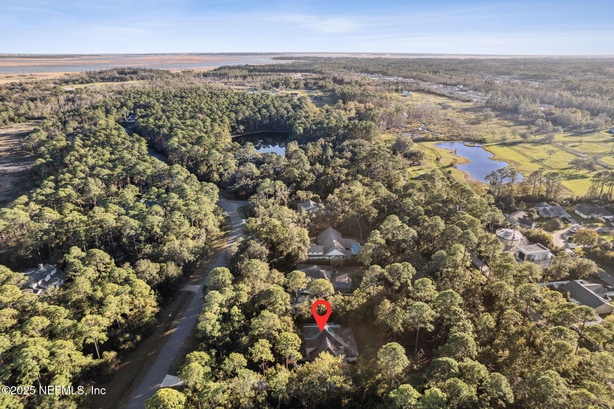 96197 Brady Point Road Fernandina Beach, FL 32034 - Photo 6 of 40 an aerial view of multiple house