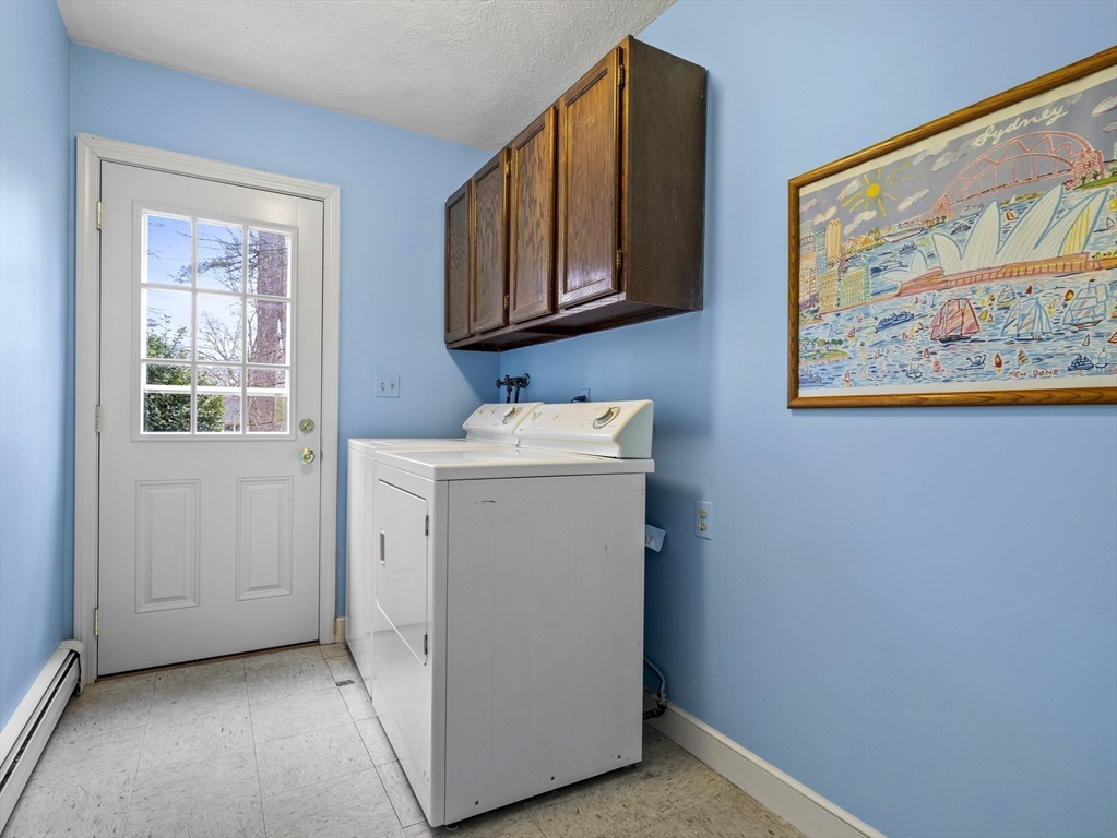 40 Audubon Road Wellesley, MA 02481 - Photo 19 of 21 a utility room with dryer and washer