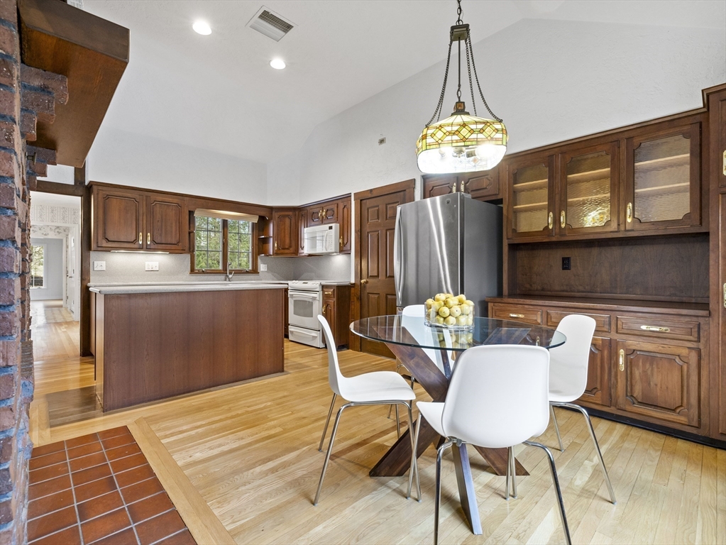40 Audubon Road Wellesley, MA 02481 - Photo 5 of 21 a view of a dining room with furniture a chandelier and wooden floor