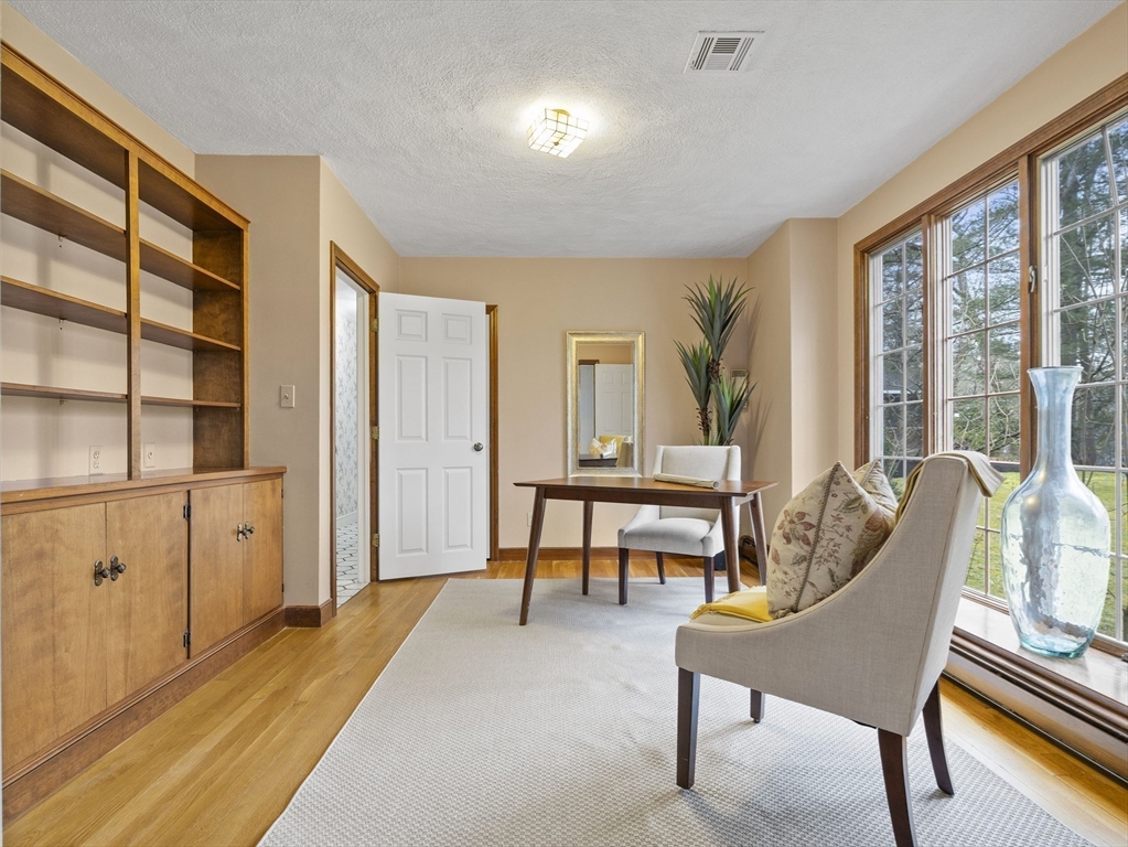 40 Audubon Road Wellesley, MA 02481 - Photo 8 of 21 a spacious bedroom with a bed and a window