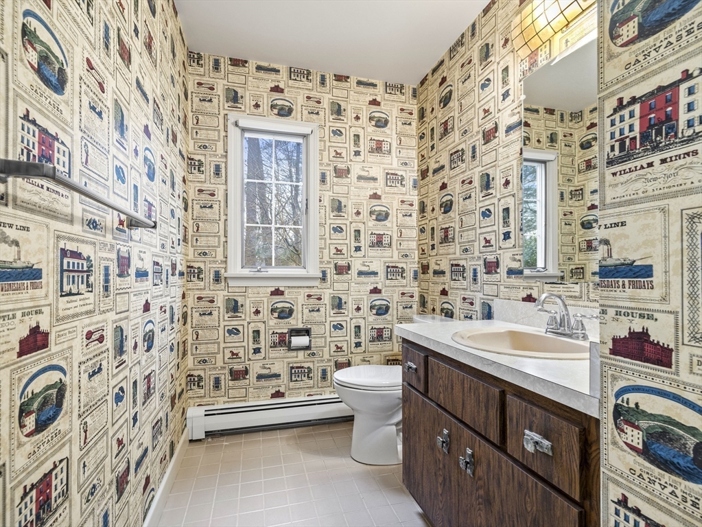 40 Audubon Road Wellesley, MA 02481 - Photo 9 of 21 a bathroom with a sink toilet and shower