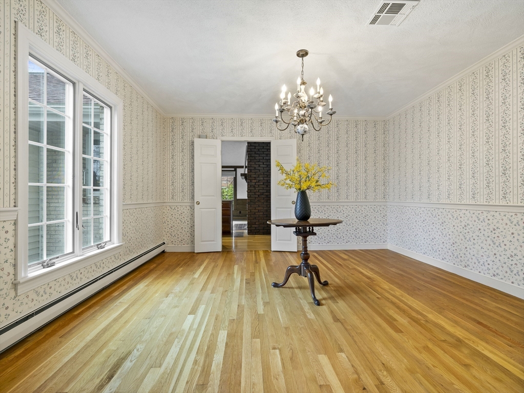 40 Audubon Road Wellesley, MA 02481 - Photo 10 of 21 a view of a room with window and wooden floor