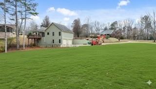 122 Horseshoe Bend Jasper, GA 30143 - Photo 41 of 47 a view of a house with a yard and sitting area