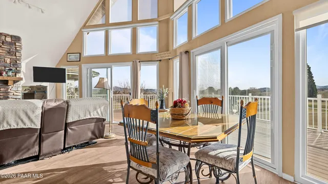 a kitchen with stainless steel appliances granite countertop a sink and a refrigerator