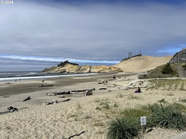a view of a street with an ocean