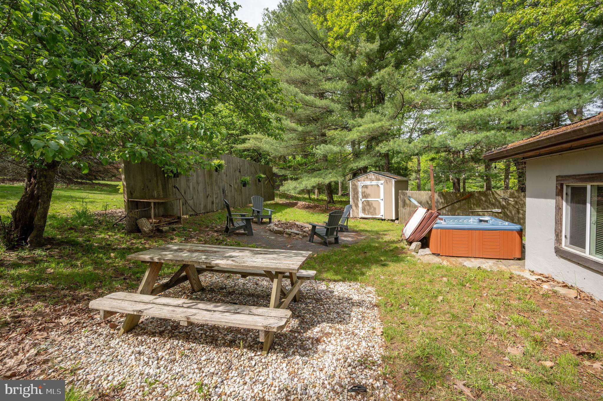 560 Glendale Road Oakland, MD 21550 - Photo 20 of 24 a view of a house with backyard porch and sitting area
