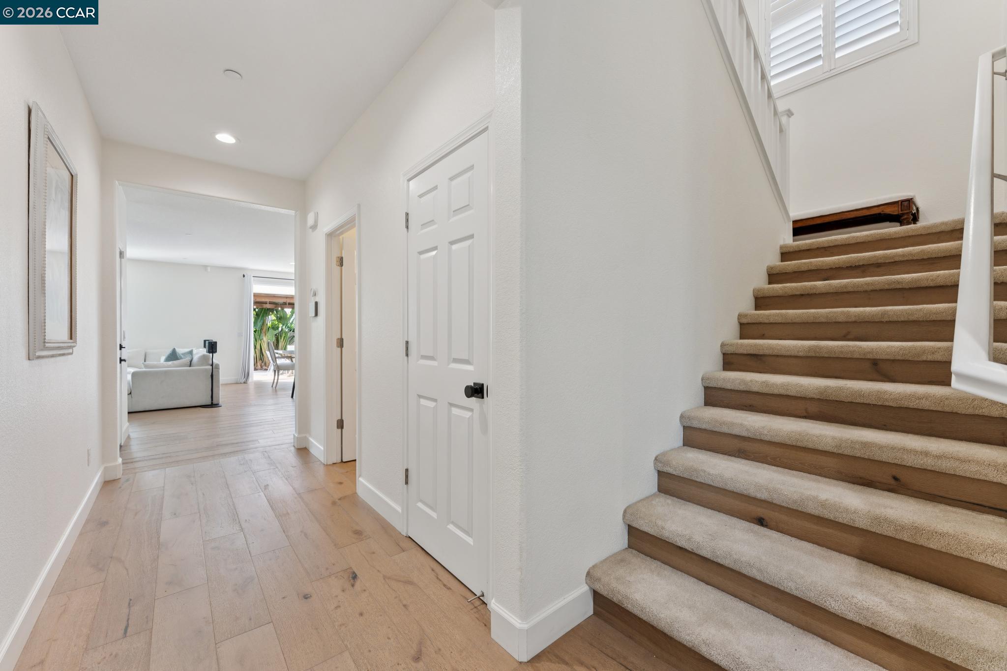 1226 Sierra Trail Road Oakley, CA 94561 - Photo 23 of 60 a view of a hallway with wooden floor and entryway
