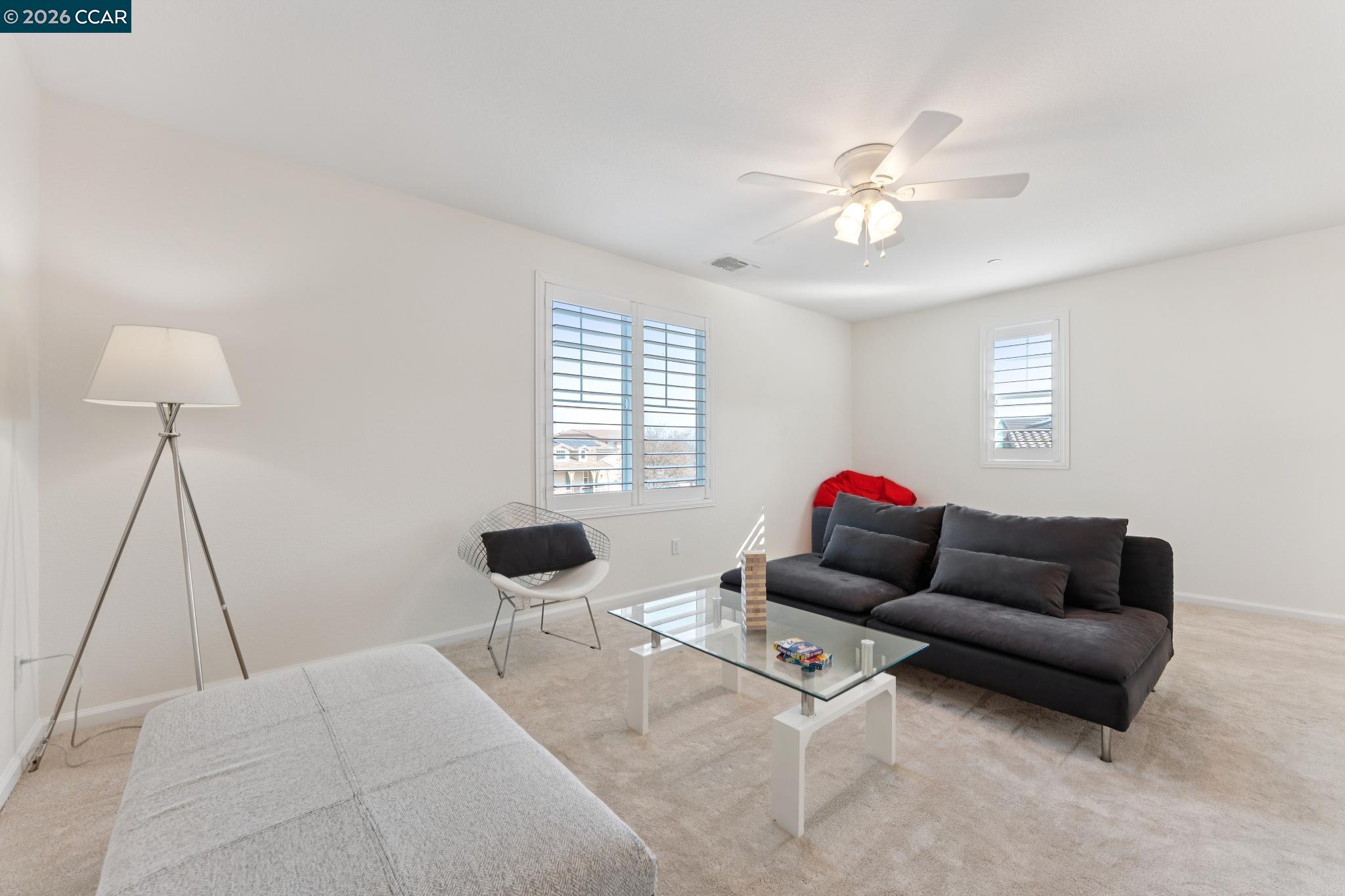 1226 Sierra Trail Road Oakley, CA 94561 - Photo 26 of 60 a living room with furniture and a window