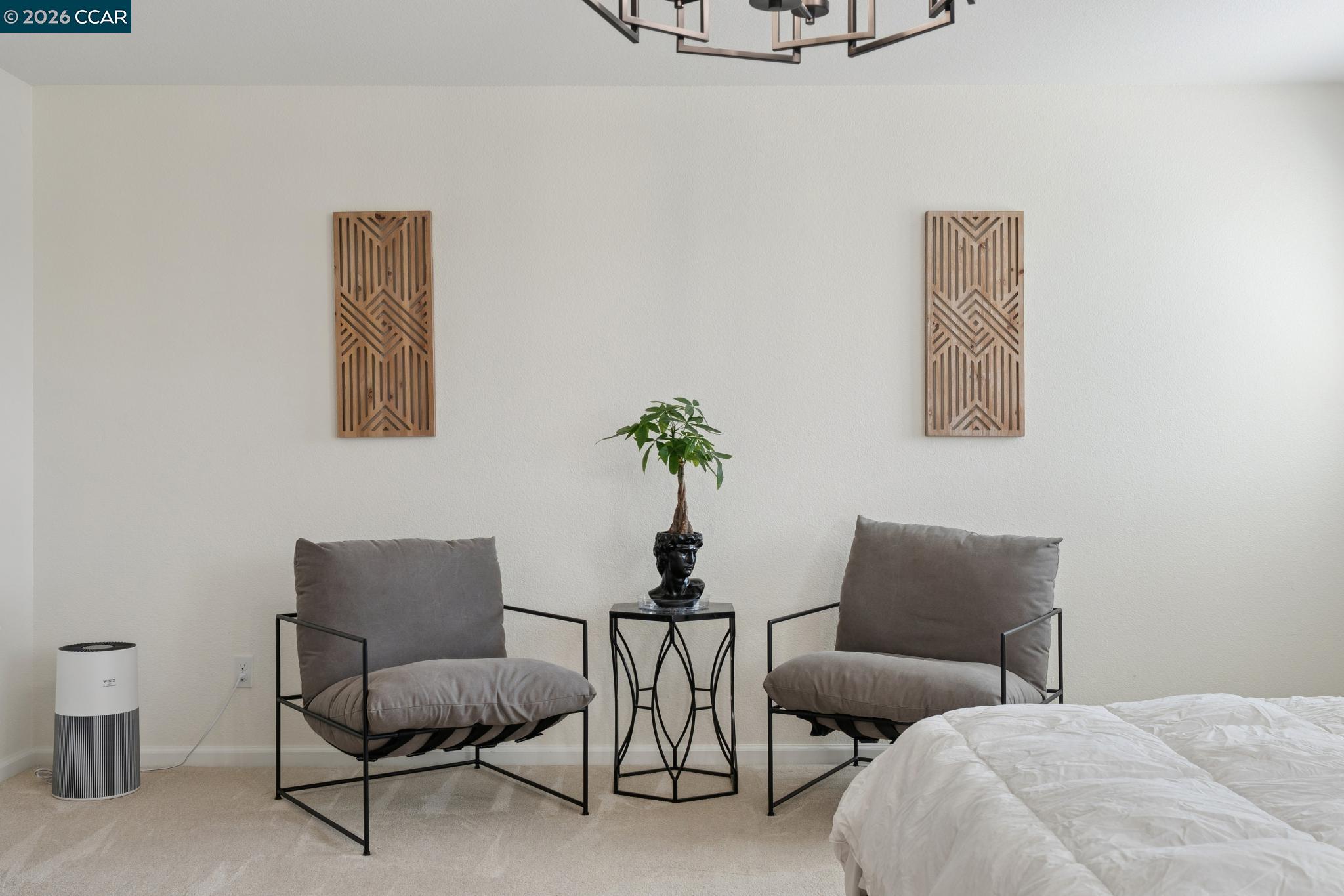 1226 Sierra Trail Road Oakley, CA 94561 - Photo 27 of 60 a bedroom with a bed and chair