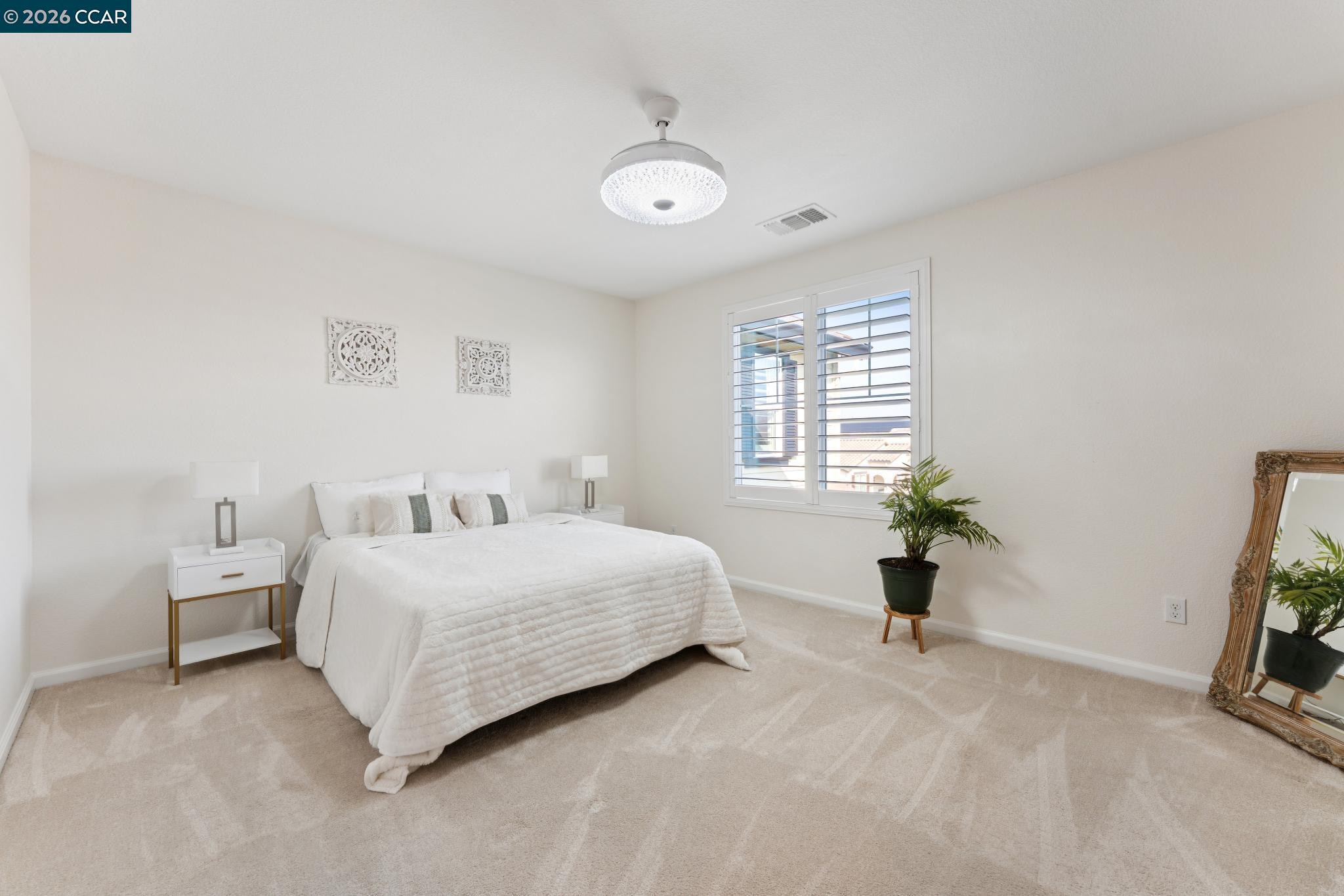 1226 Sierra Trail Road Oakley, CA 94561 - Photo 38 of 60 a bedroom with a bed and a couch