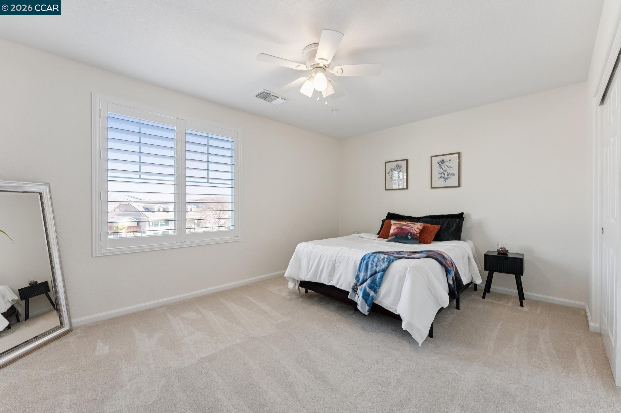 1226 Sierra Trail Road Oakley, CA 94561 - Photo 40 of 60 a bedroom with a bed and a window