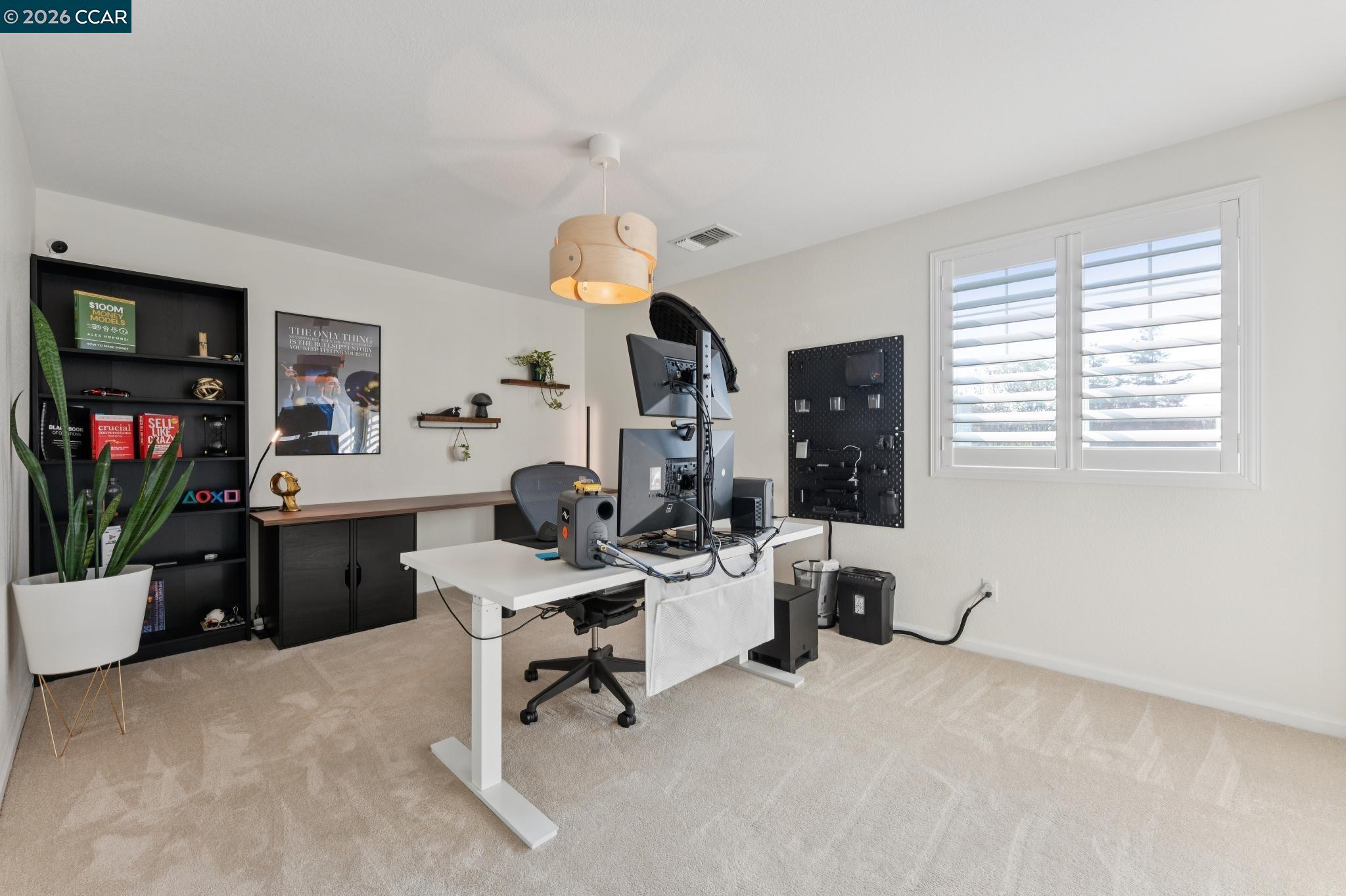 1226 Sierra Trail Road Oakley, CA 94561 - Photo 45 of 60 a living room with furniture and a flat screen tv