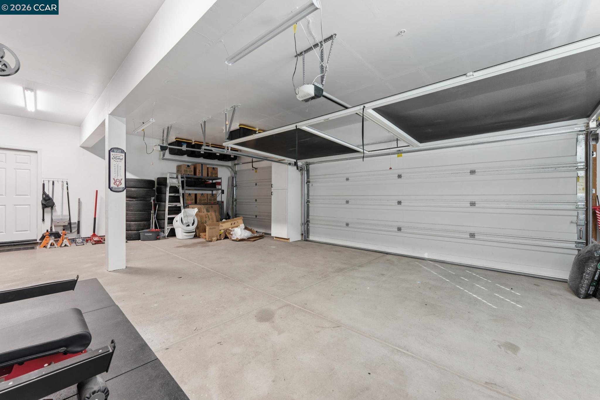 1226 Sierra Trail Road Oakley, CA 94561 - Photo 50 of 60 a view of a garage with furniture