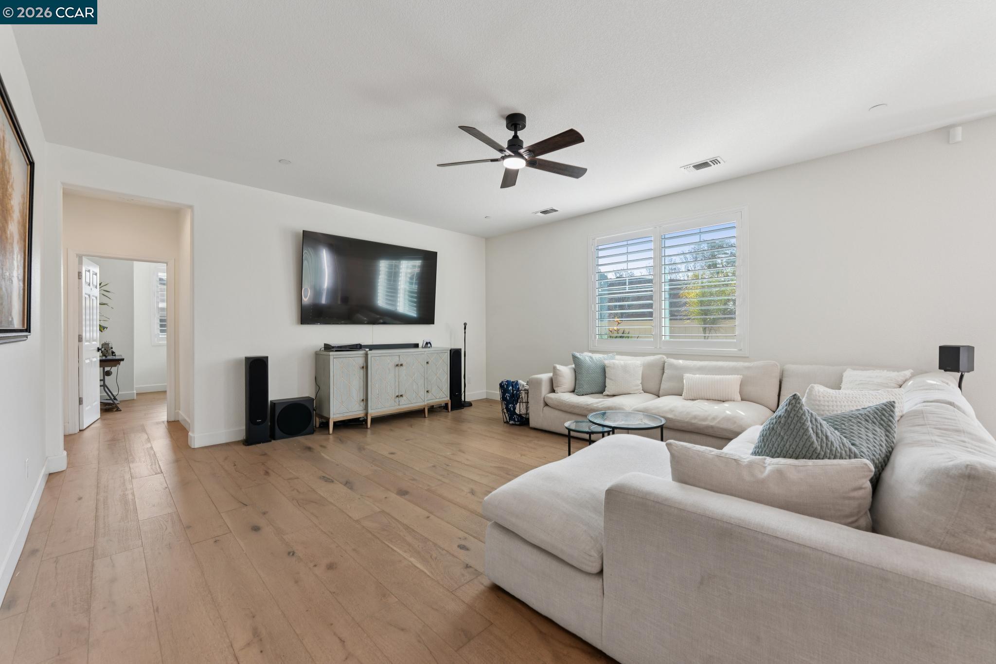 1226 Sierra Trail Road Oakley, CA 94561 - Photo 5 of 60 a living room with furniture and a flat screen tv