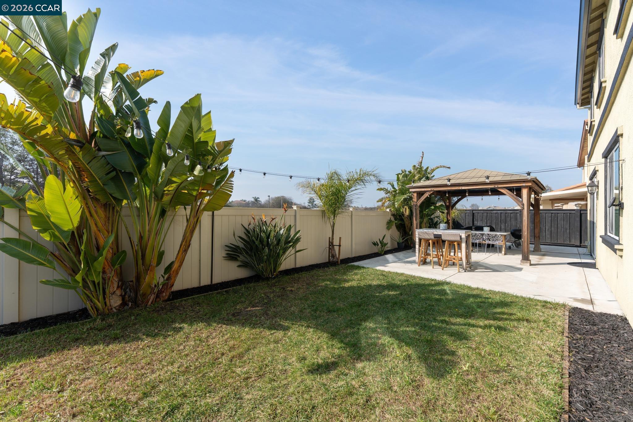 1226 Sierra Trail Road Oakley, CA 94561 - Photo 59 of 60 a view of a backyard with furniture and a yard