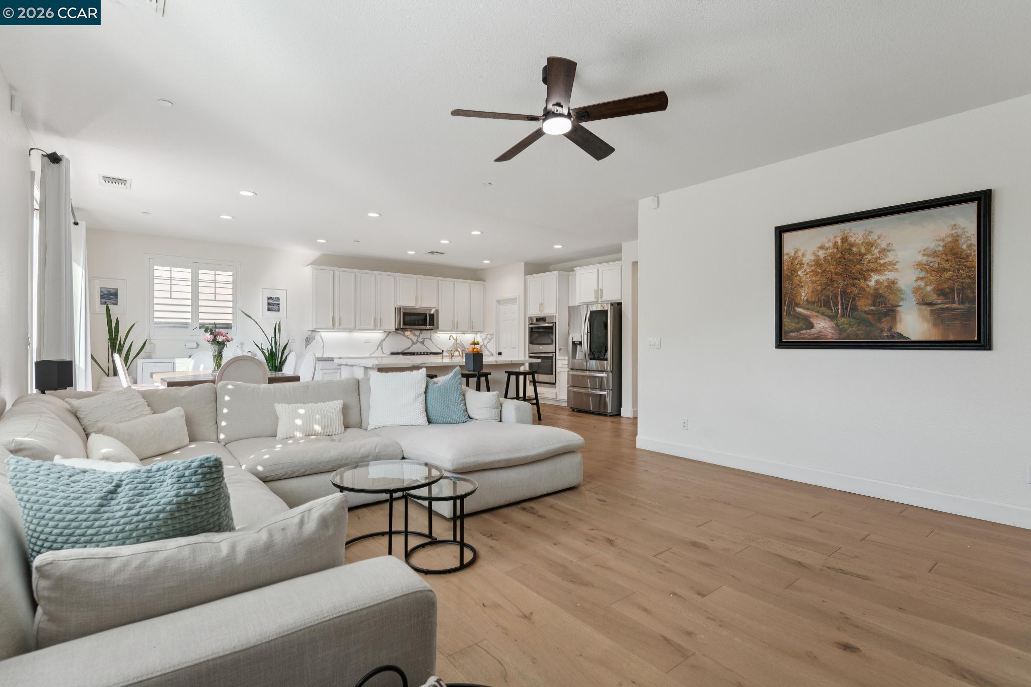 1226 Sierra Trail Road Oakley, CA 94561 - Photo 7 of 60 a living room with furniture and a view of kitchen