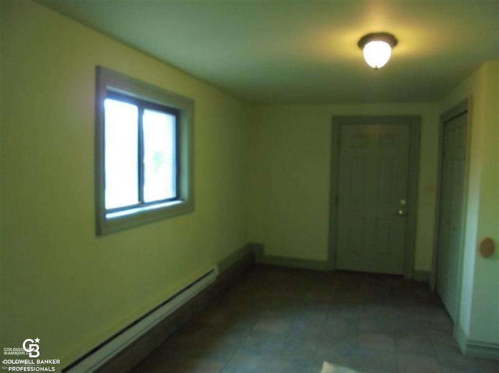 9187 Springborn Road Casco, MI 48064 - Photo 14 of 60 Ceramic Foyer