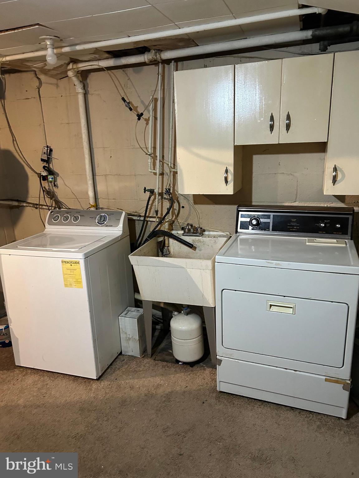 1804 Winford Road Baltimore, MD 21239 - Photo 13 of 18 a utility room with dryer and washer
