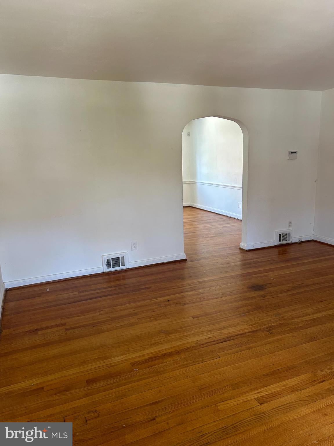 1804 Winford Road Baltimore, MD 21239 - Photo 2 of 18 a view of a room with wooden floor