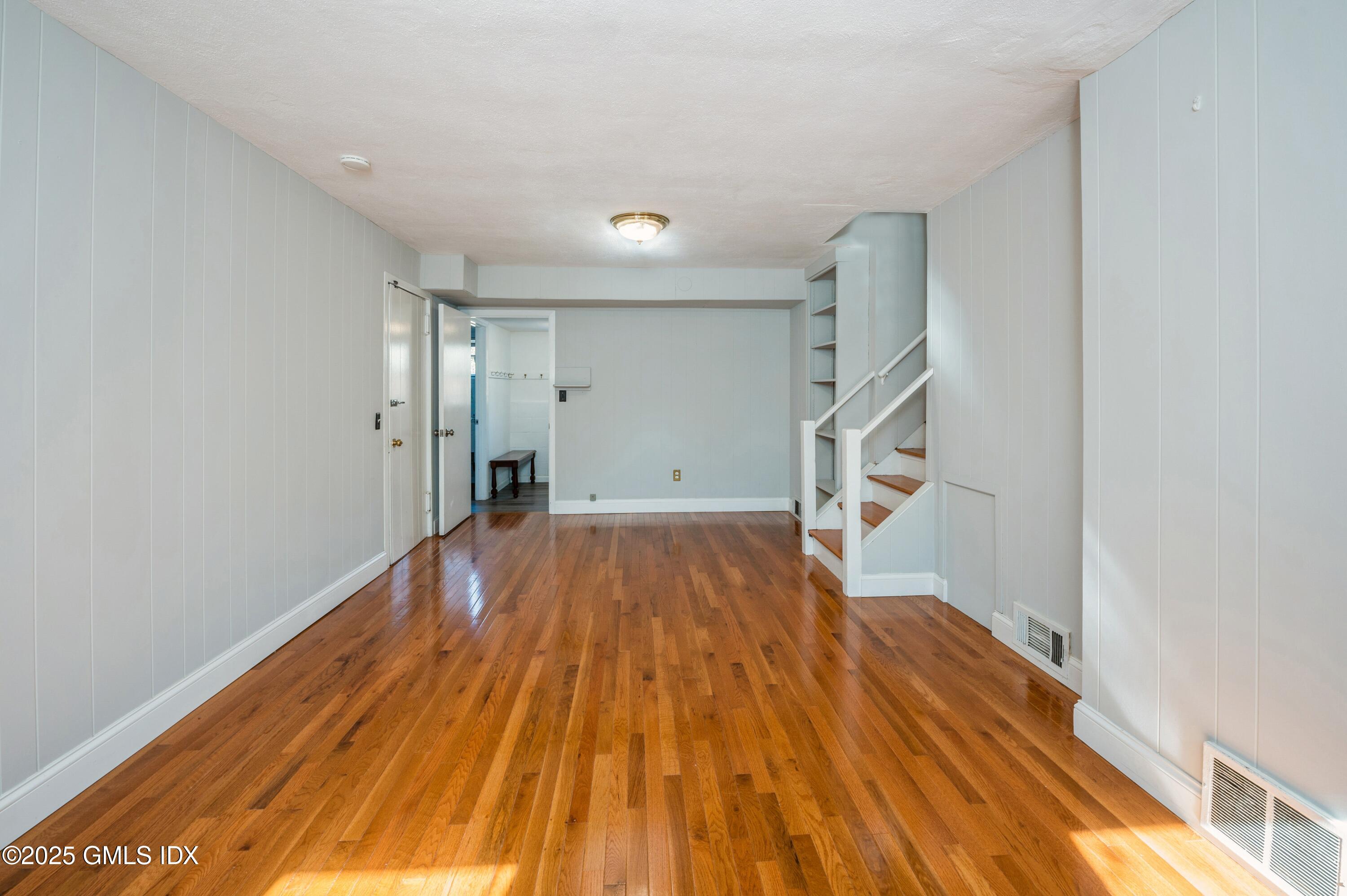 19 Bayside Terrace Riverside, CT 06878 - Photo 14 of 22 a view of empty room with wooden floor
