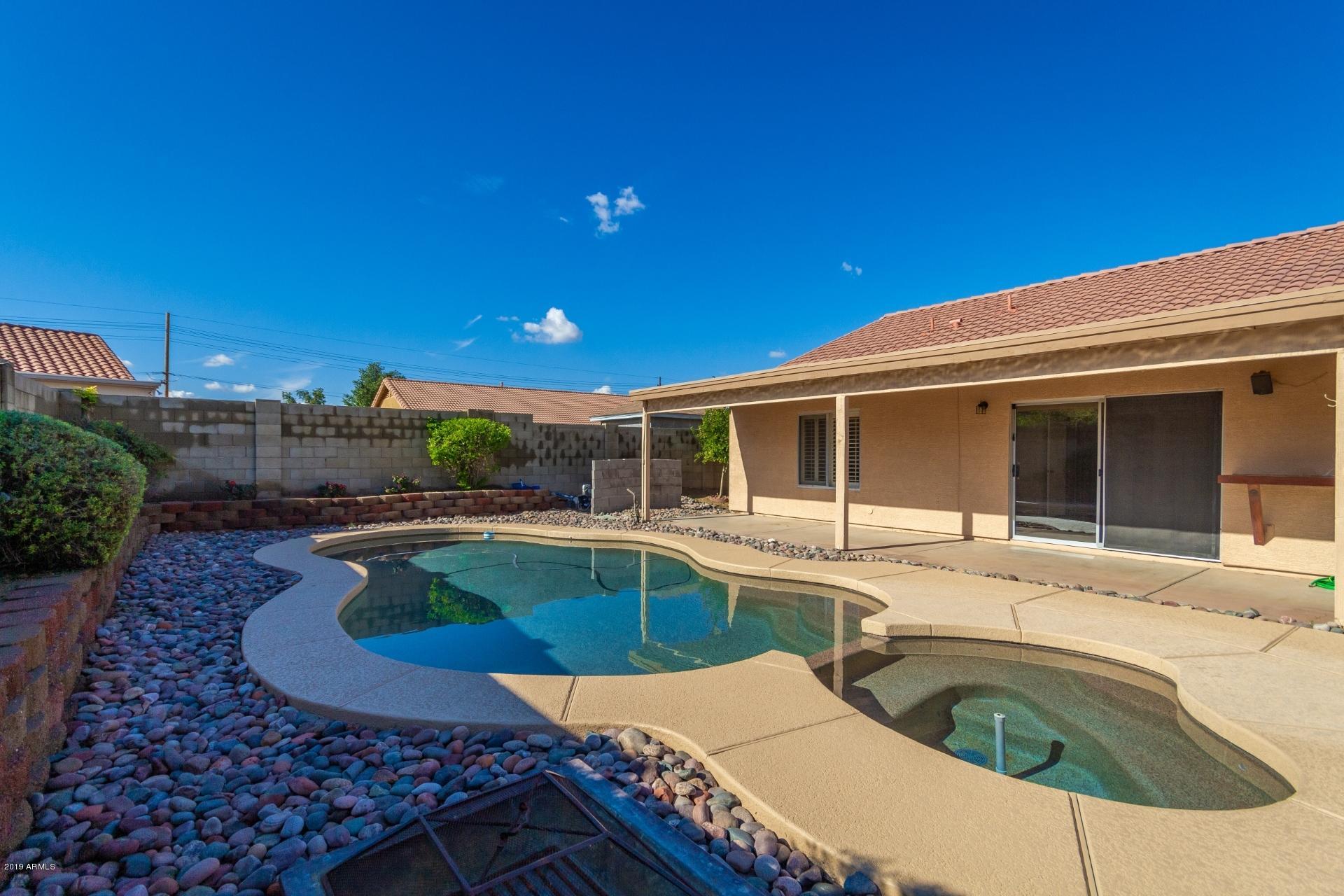 1623 East Carson Road Phoenix, AZ 85042 - Photo 20 of 22 Pool, Spa, & Covered Patio