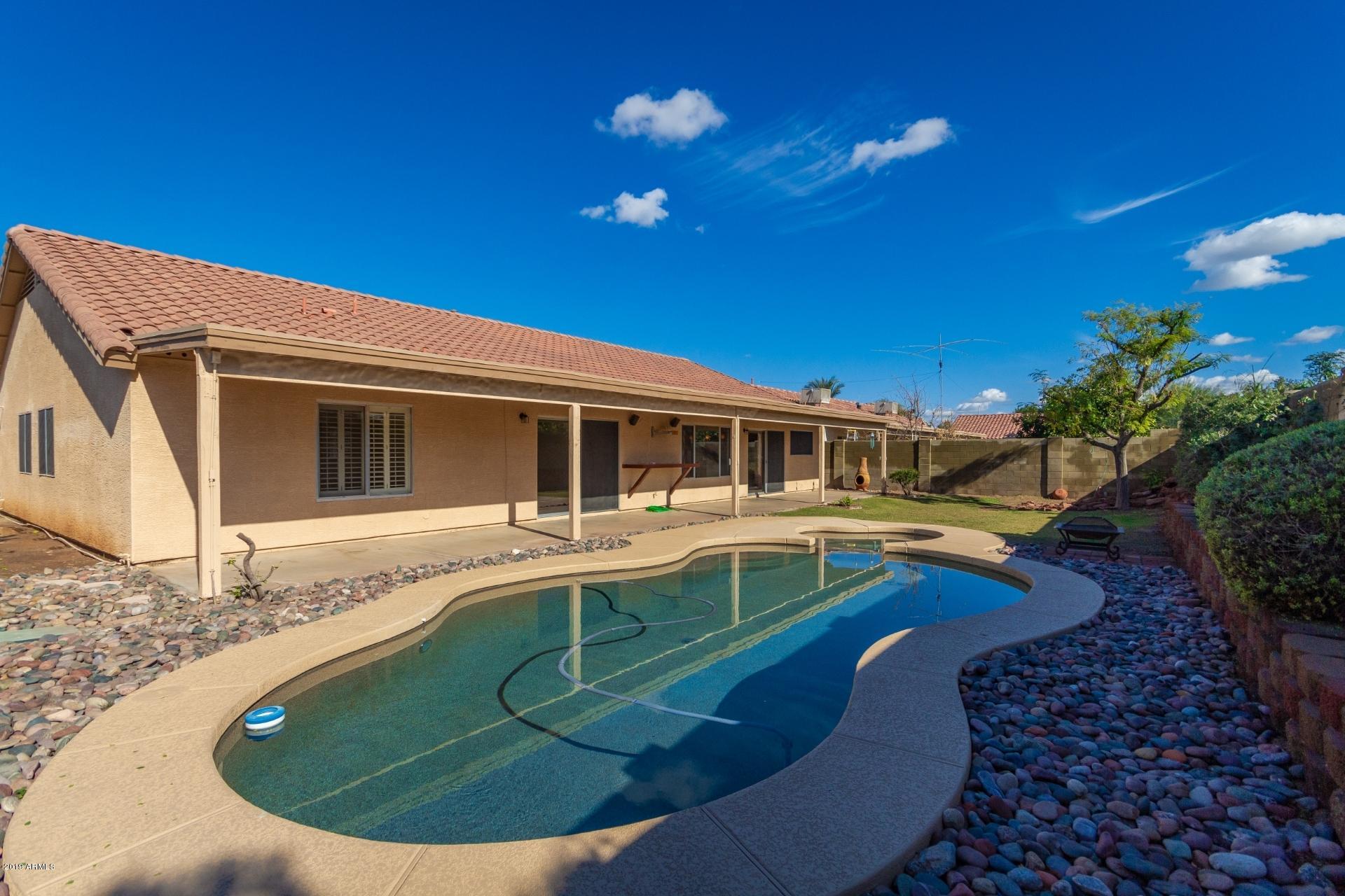 1623 East Carson Road Phoenix, AZ 85042 - Photo 21 of 22 Pool, Spa, and Back Yard