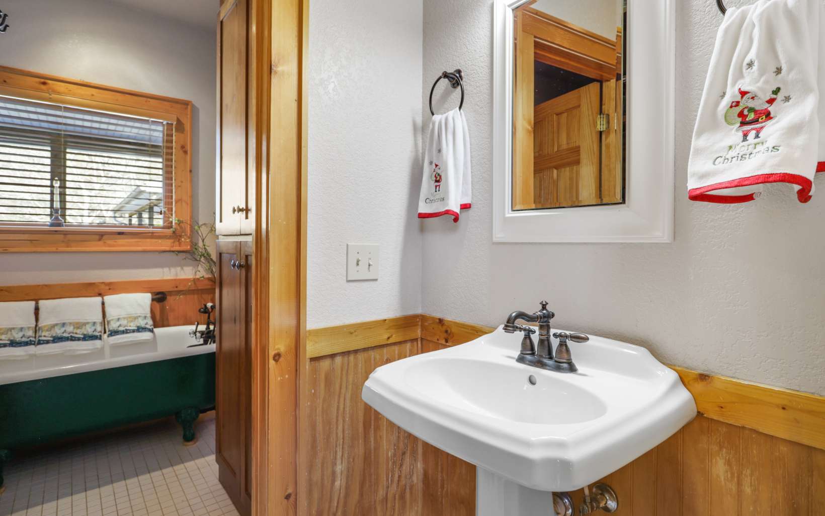 303 Campbell Cove Road Turtletown, TN 37391 - Photo 18 of 44 a bathroom with a sink and a mirror