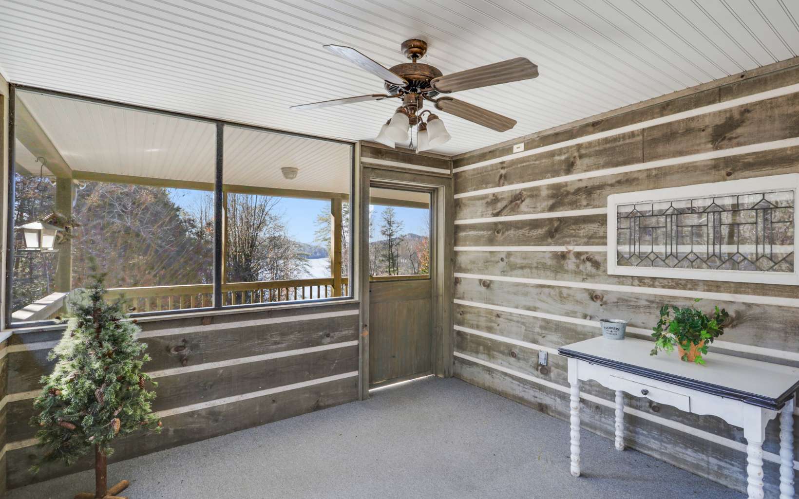 303 Campbell Cove Road Turtletown, TN 37391 - Photo 22 of 44 a view of room with window and a ceiling fan