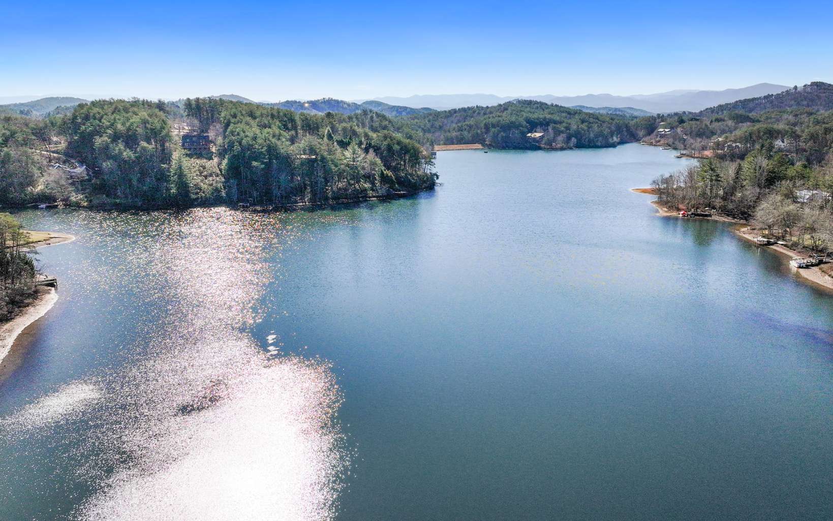303 Campbell Cove Road Turtletown, TN 37391 - Photo 3 of 44 a view of a lake with mountain