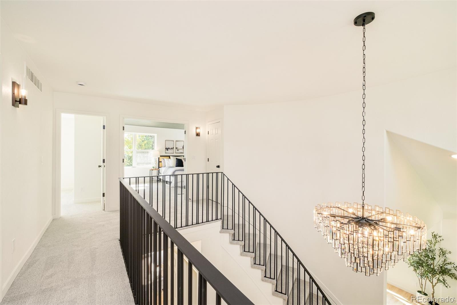 8176 Lone Oak Court Lone Tree, CO 80124 - Photo 19 of 50 a view of staircase with railing