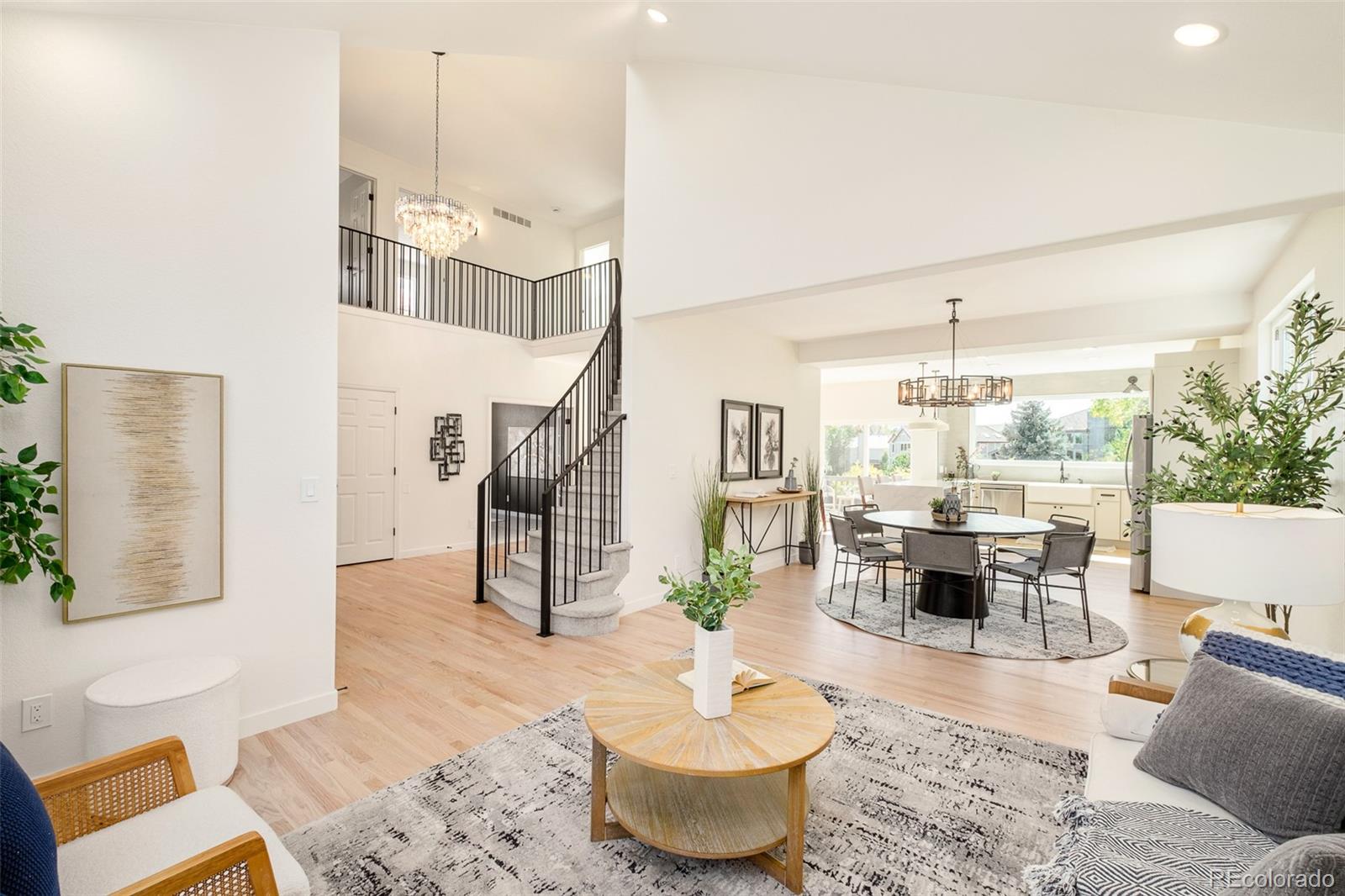 8176 Lone Oak Court Lone Tree, CO 80124 - Photo 2 of 50 a living room with furniture and a large window