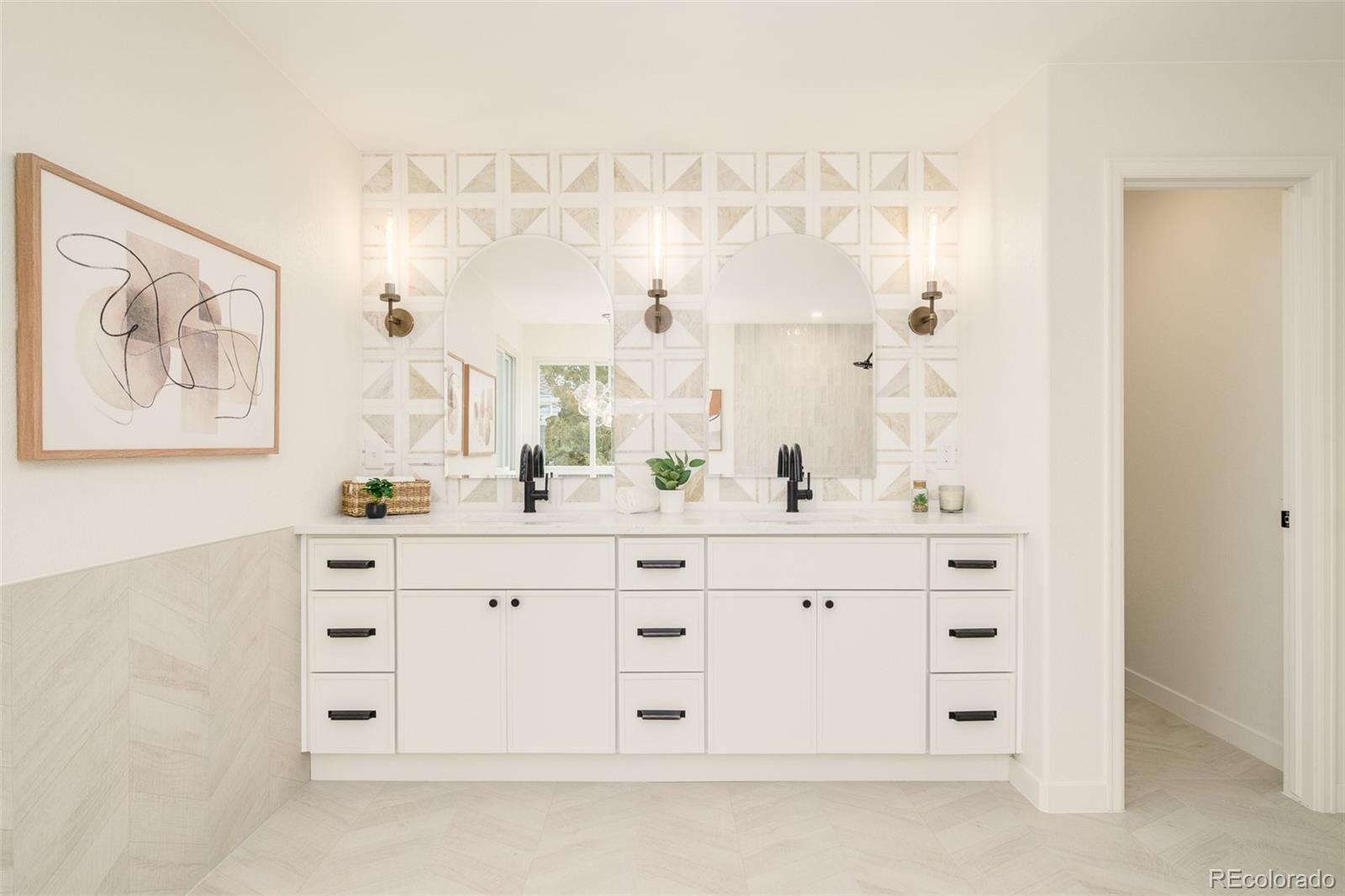 8176 Lone Oak Court Lone Tree, CO 80124 - Photo 24 of 50 a bathroom with a double vanity sink mirror and
