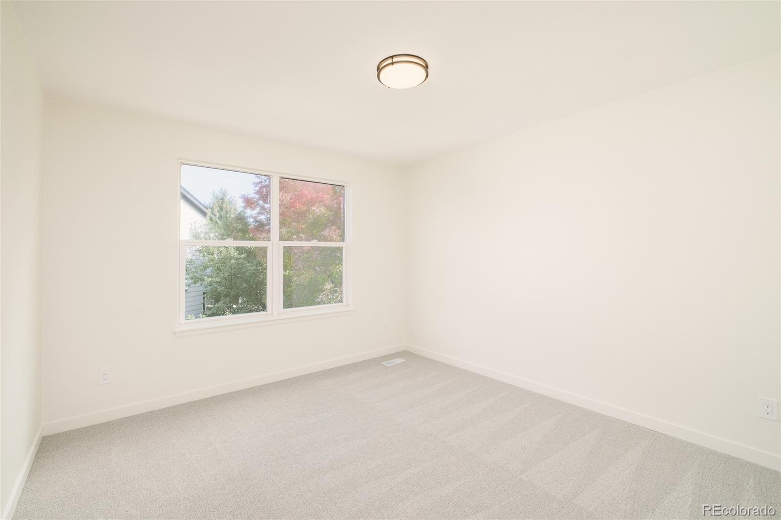 8176 Lone Oak Court Lone Tree, CO 80124 - Photo 25 of 50 an empty room with a window