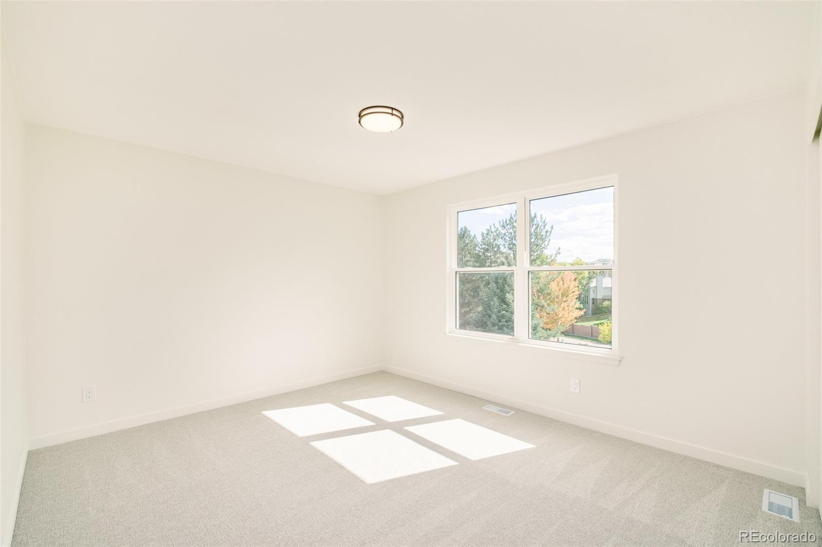 8176 Lone Oak Court Lone Tree, CO 80124 - Photo 26 of 50 an empty room with a window