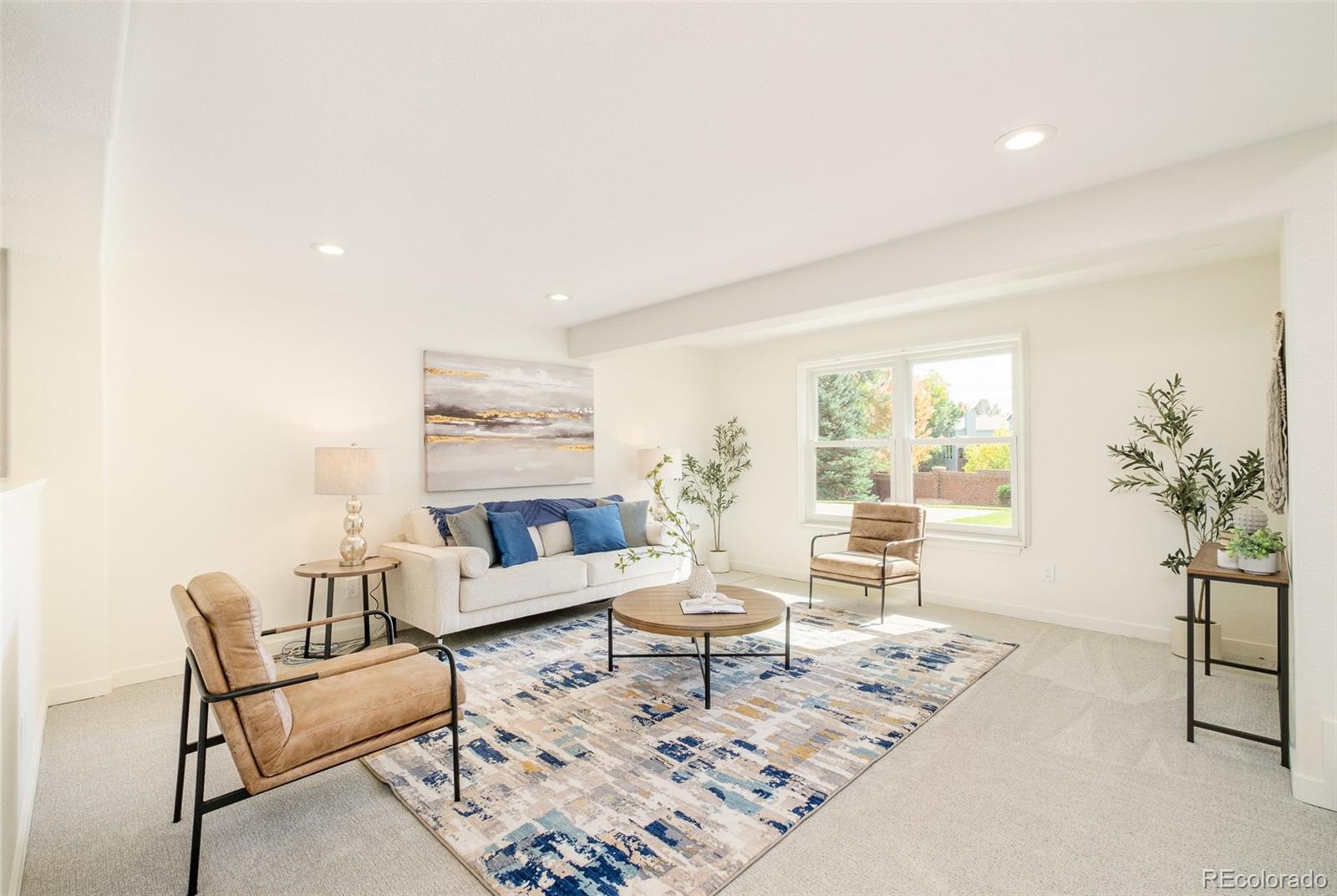 8176 Lone Oak Court Lone Tree, CO 80124 - Photo 31 of 50 a living room with furniture and a large window