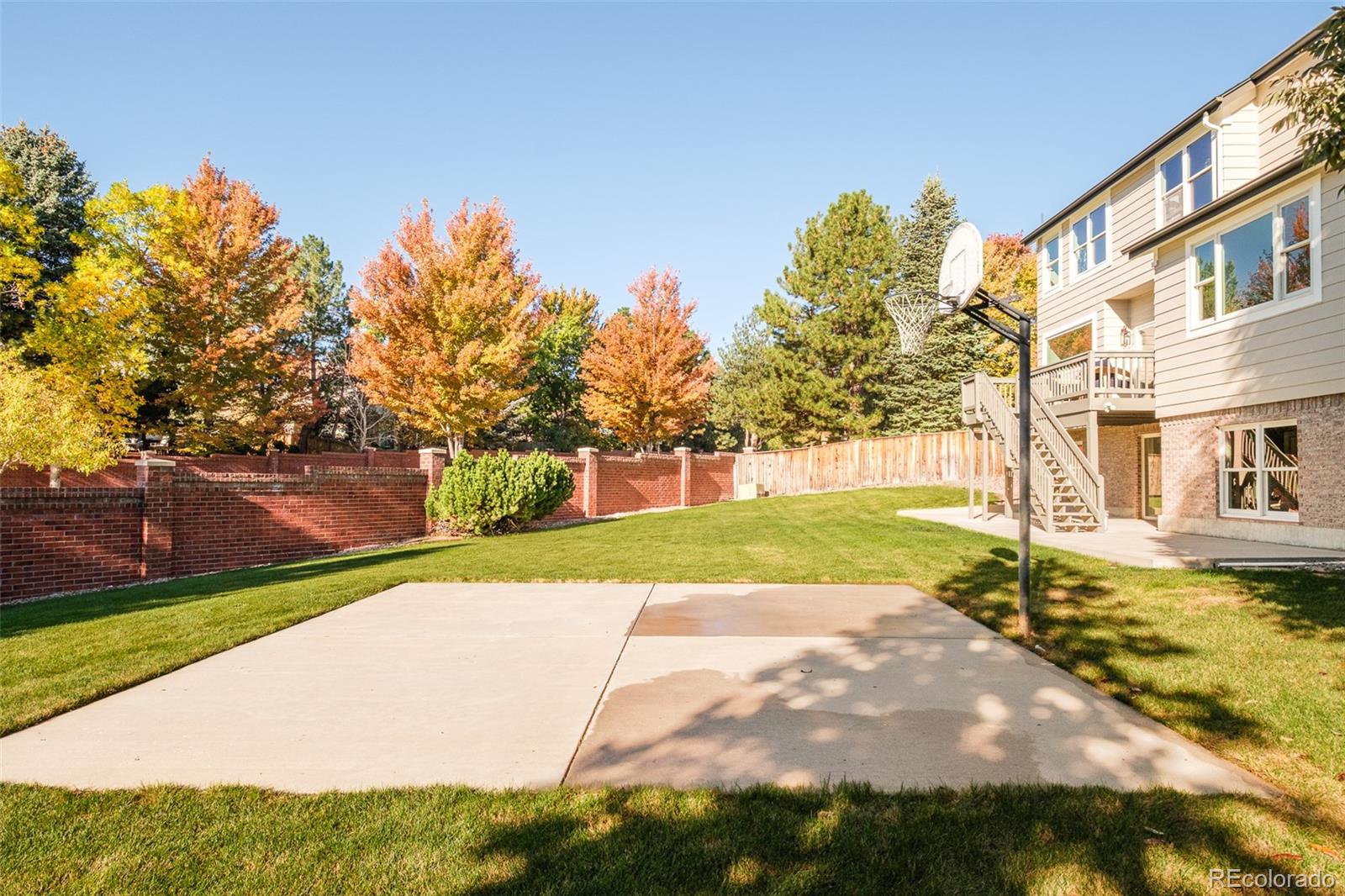 8176 Lone Oak Court Lone Tree, CO 80124 - Photo 40 of 50 a view of a street with a building in the background