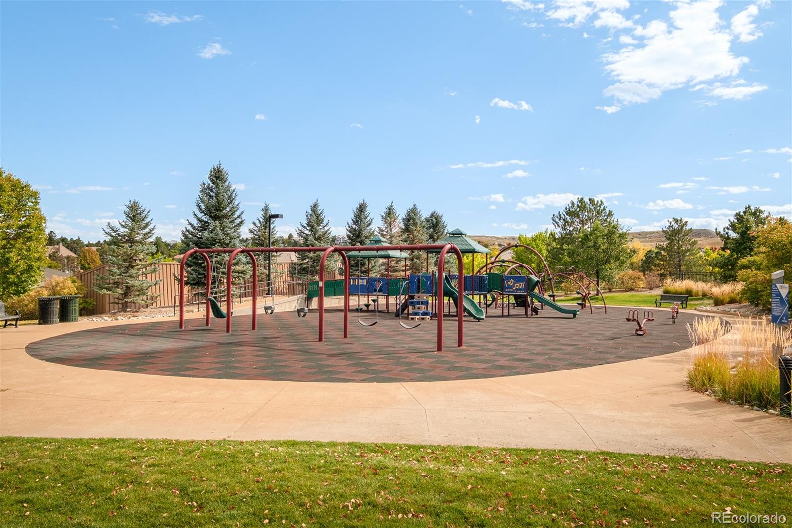 8176 Lone Oak Court Lone Tree, CO 80124 - Photo 46 of 50 a view of a swimming pool and trees