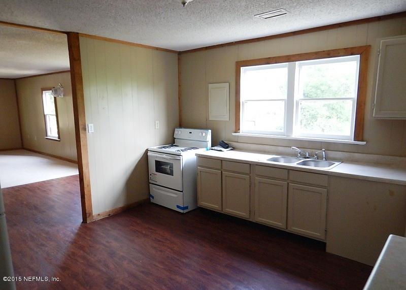 9020 Reid Packing House Road Hastings, FL 32145 - Photo 3 of 10 a utility room with washer and dryer