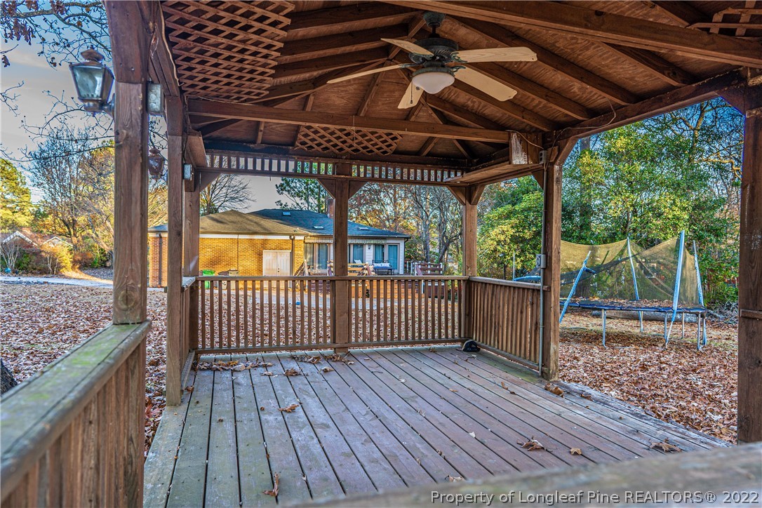 1075 Burning Tree Road Pinehurst, NC 28374 - Photo 19 of 25 a view of porch with wooden floor