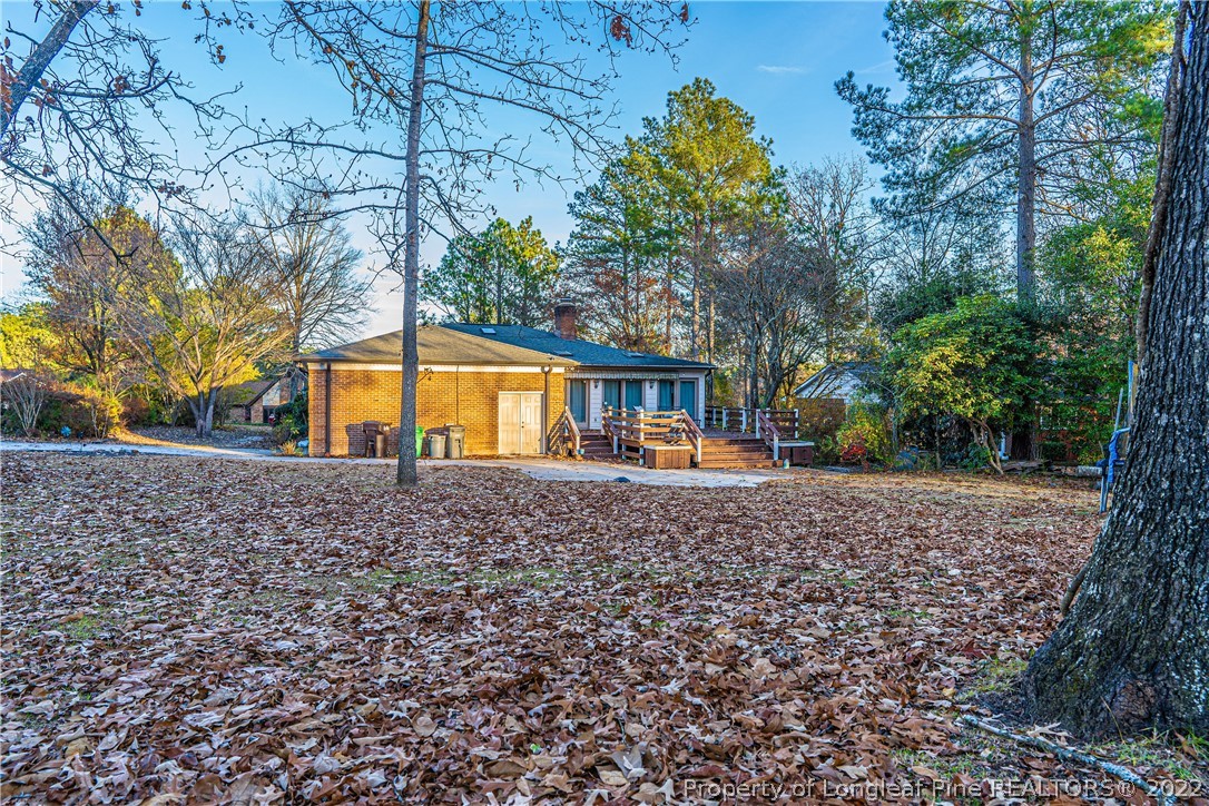 1075 Burning Tree Road Pinehurst, NC 28374 - Photo 21 of 25 a view of outdoor space yard and porch