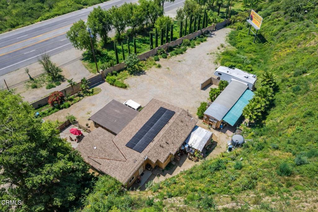 561 East Telegraph Road Fillmore, CA 93015 - Photo 21 of 29 an aerial view of a house with a yard and lake view