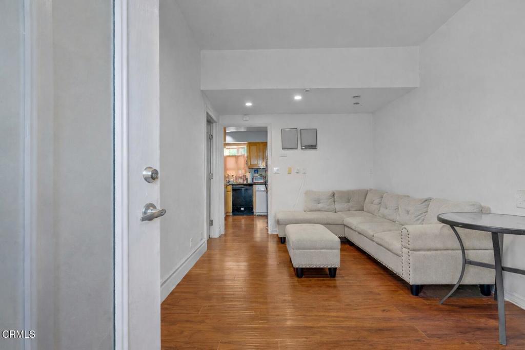 561 East Telegraph Road Fillmore, CA 93015 - Photo 5 of 29 a living room with furniture and a wooden floor