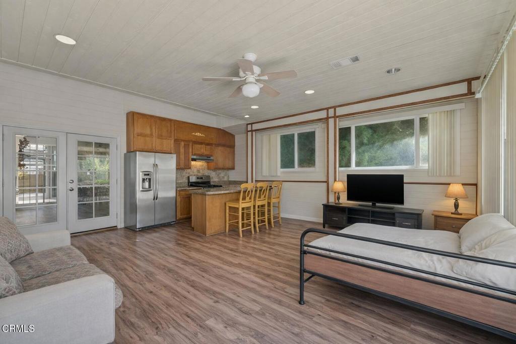 561 East Telegraph Road Fillmore, CA 93015 - Photo 10 of 29 a living room with furniture and a fireplace