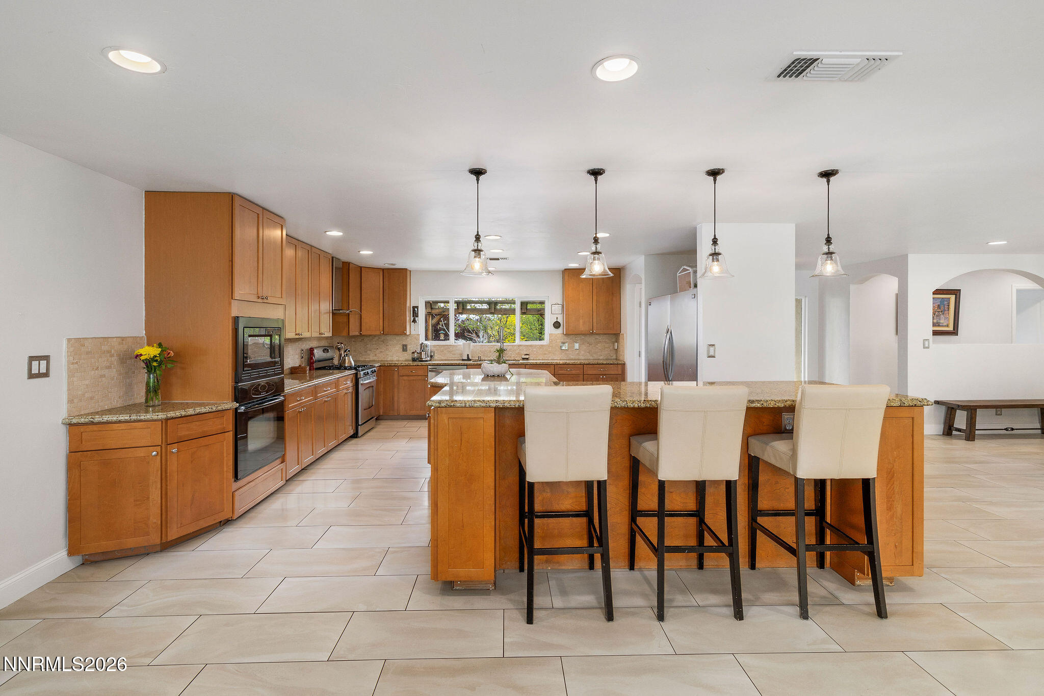 2785 Skyline Boulevard Reno, NV 89509 - Photo 13 of 65 a large kitchen with lots of furniture and appliances