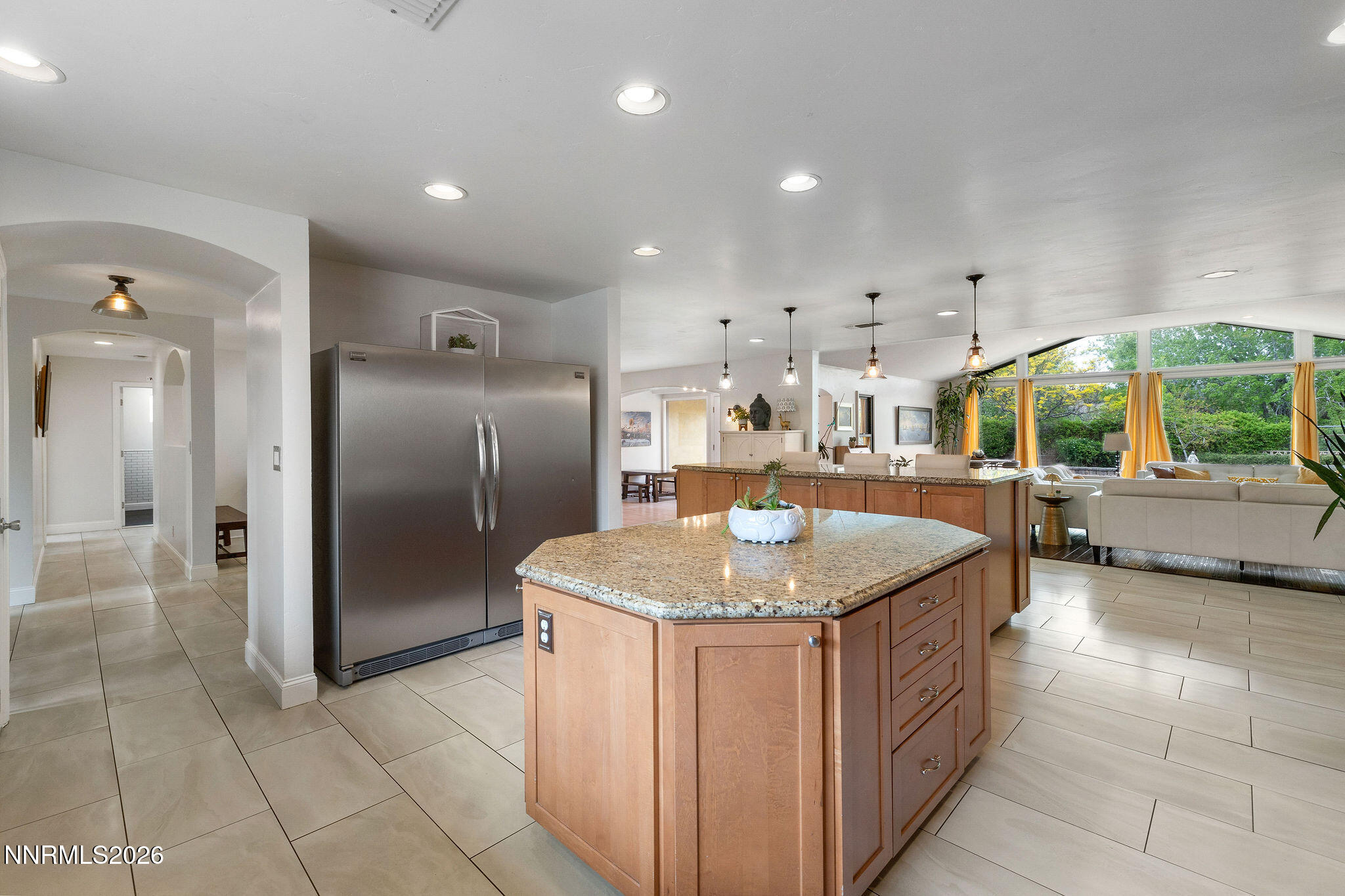 2785 Skyline Boulevard Reno, NV 89509 - Photo 15 of 65 a kitchen with stainless steel appliances granite countertop a sink and a refrigerator