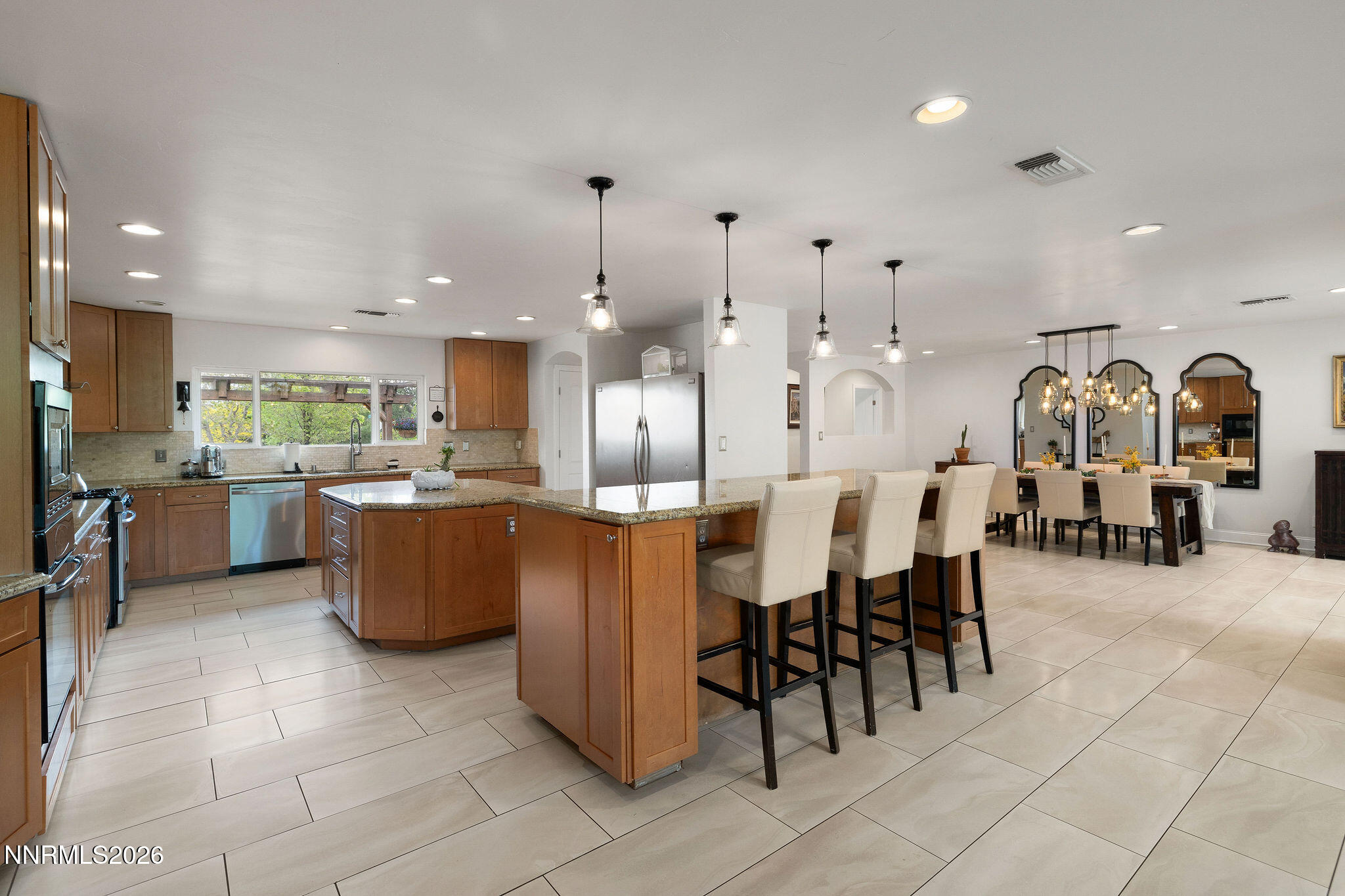 2785 Skyline Boulevard Reno, NV 89509 - Photo 21 of 65 a large kitchen with a table and chairs