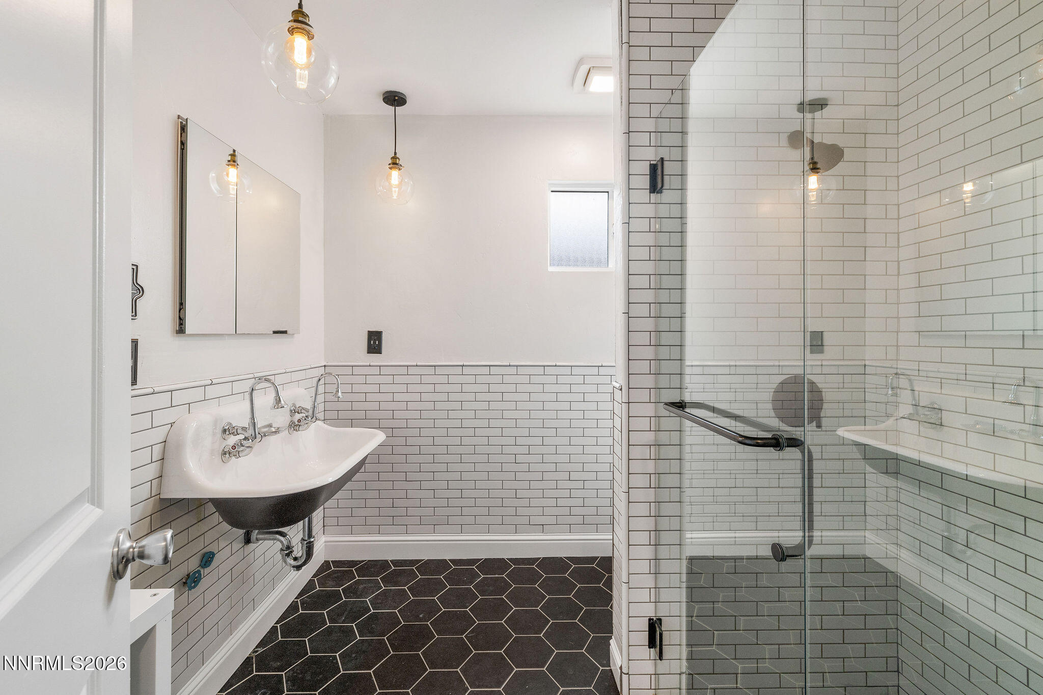 2785 Skyline Boulevard Reno, NV 89509 - Photo 27 of 65 a bathroom with a sink and a mirror
