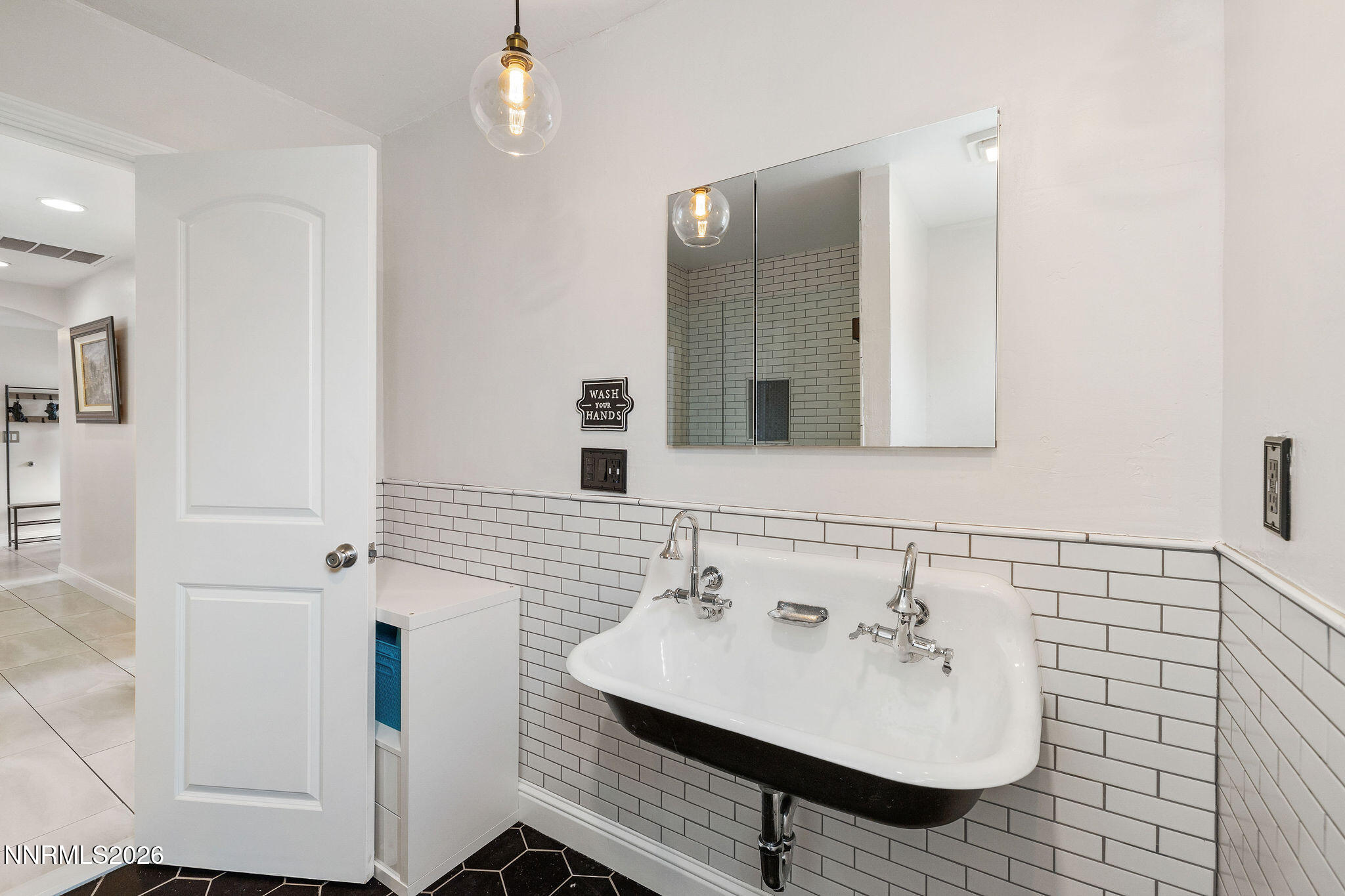 2785 Skyline Boulevard Reno, NV 89509 - Photo 28 of 65 a bathroom with a sink and a mirror