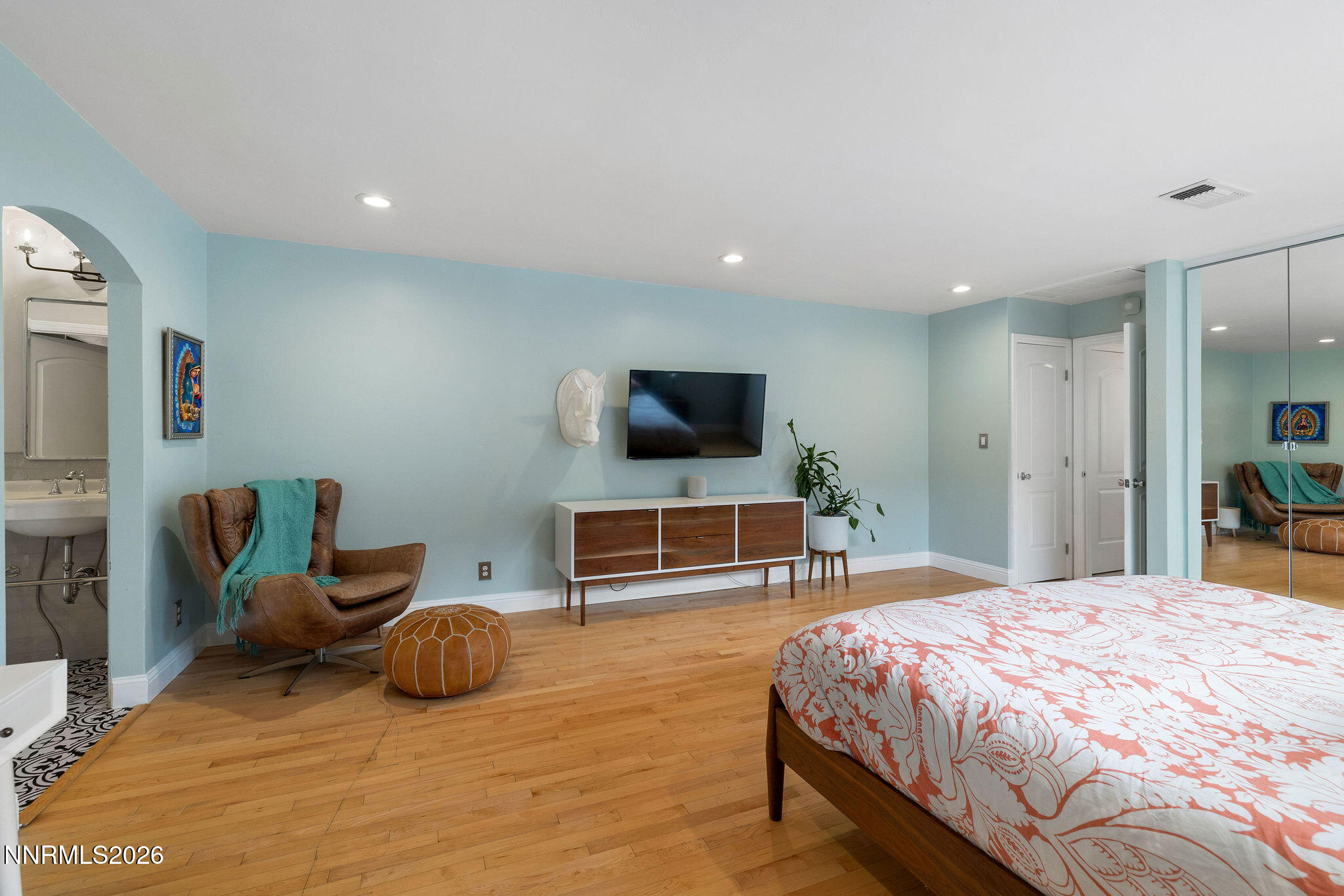 2785 Skyline Boulevard Reno, NV 89509 - Photo 30 of 65 a bedroom with a bed and a flat screen tv