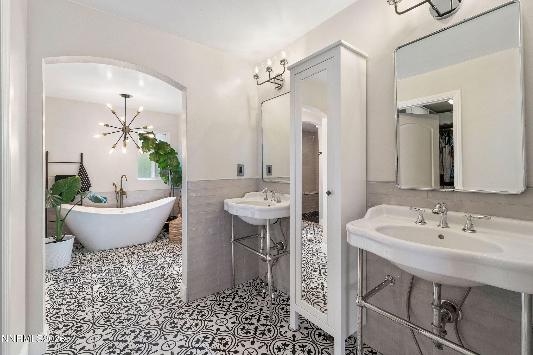 2785 Skyline Boulevard Reno, NV 89509 - Photo 31 of 65 a spacious bathroom with a double vanity sink and a mirror